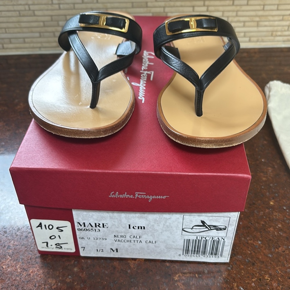Salvatore Ferragamo Black and Tan Sandals with Gold Accent size 7. 1/2
